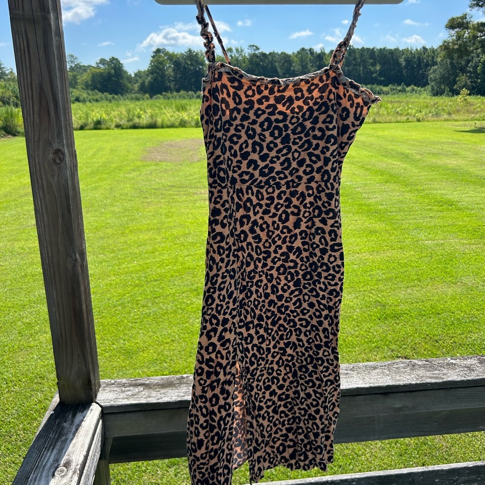 Only worn a few times. Very comfortable and light weight dress.